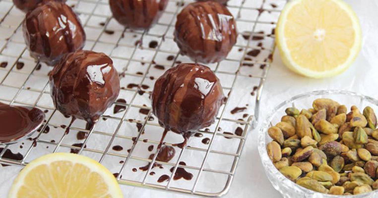 Decadent chocolate truffles kissed with pistachio crunch – a little bite of heaven