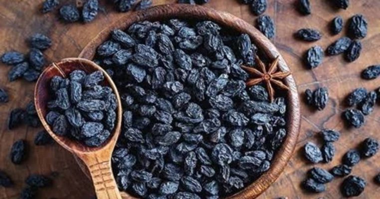 A bowl of black Kismis — rich in flavor, packed with nutrients, and naturally sweet. Pure goodness in every bite