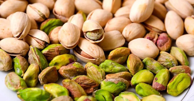 Pistachios with shells and without shells Comparing