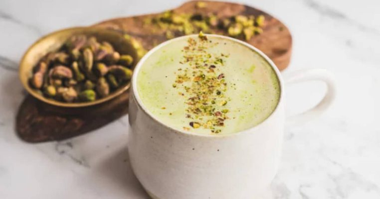 A delightful touch of pistachio garnish! Savor every sip of this creamy pistachio coffee. A delightful touch of pistachio garnish! Savor every sip of this creamy pistachio coffee.